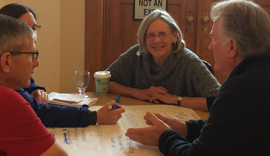 Iowa farmers Kathy & Dave Gerber (R) help shape local ideas with Karen Wilke of The Nature Conservancy & farmer Tim Smith (L)