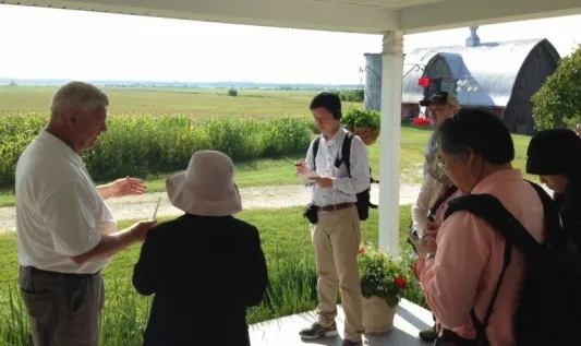 Brent Hoerr discusses biotechnology with a Japanese media team