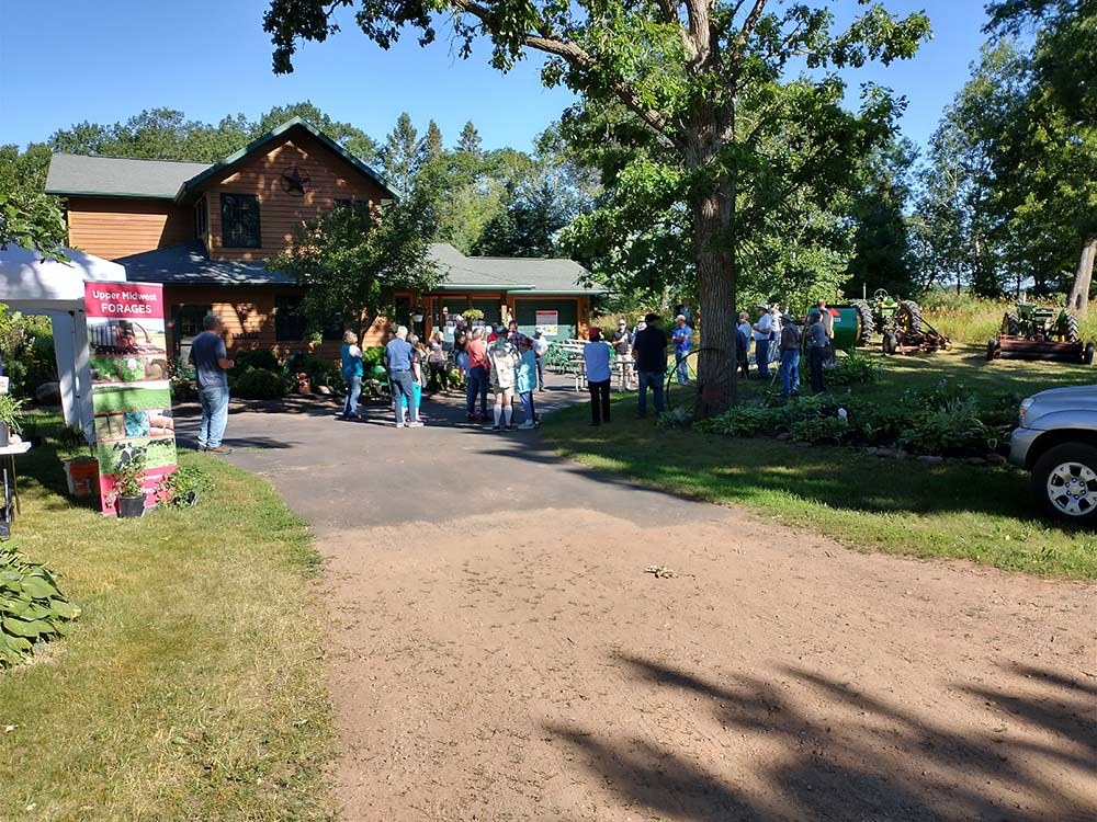 Neighbors gather at Dave and Veronica Fogerty's Black Creek Bison Ranch west of Spooner to see test plots of alternative and emergency forages