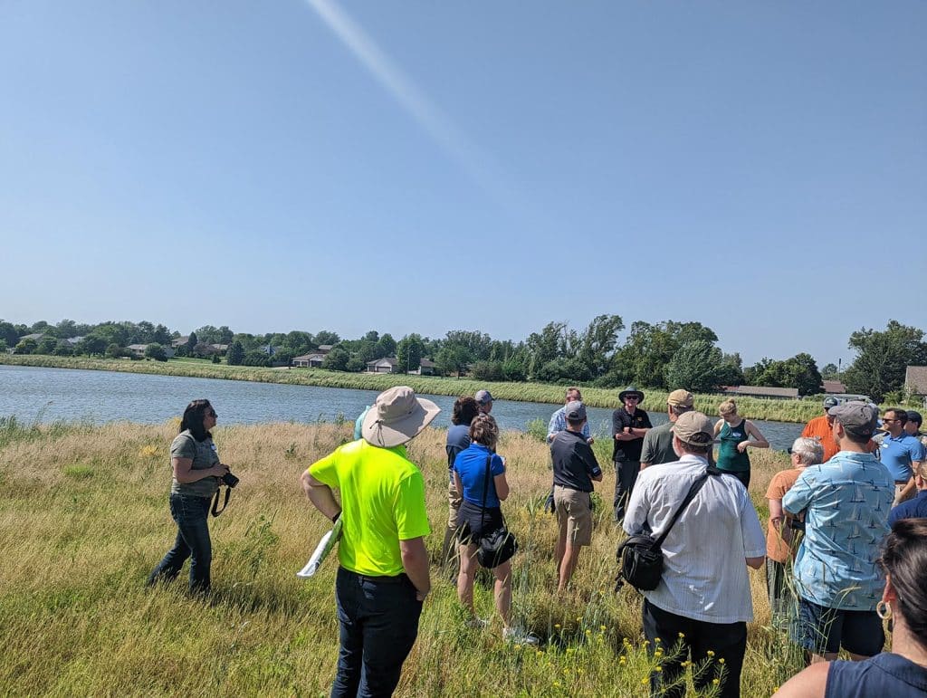 people gathering at watershed